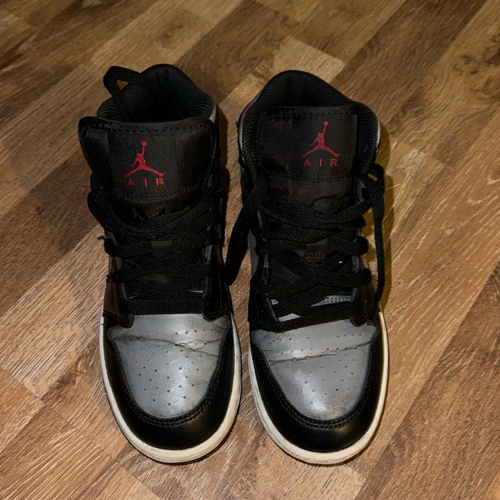 Girls size 4Y Air Jordan 1 Mid GS 'Shadow.'